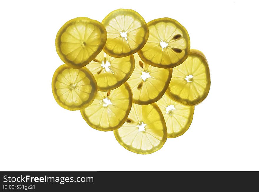 Lemon slices, backlit, stacked on top of each other. Lemon slices, backlit, stacked on top of each other