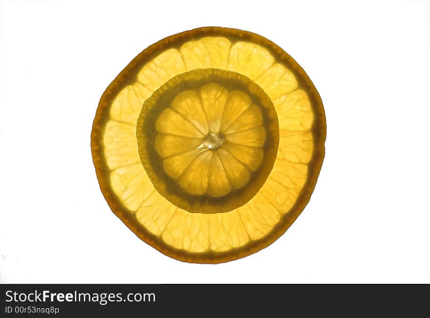 Orange slices, backlit, stacked on top of each other. Orange slices, backlit, stacked on top of each other