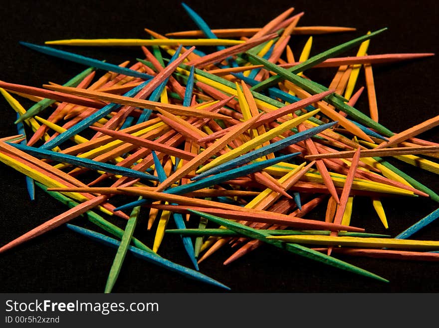 A shot of a pile of toothpicks. A shot of a pile of toothpicks.