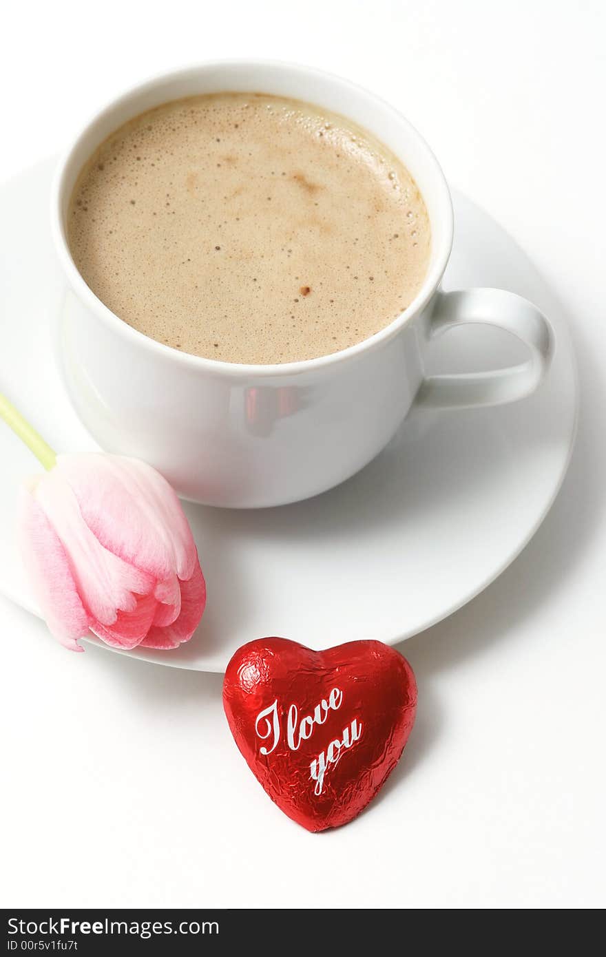 Coffee cup with coffee,heart and pink tulip on white background. Coffee cup with coffee,heart and pink tulip on white background.