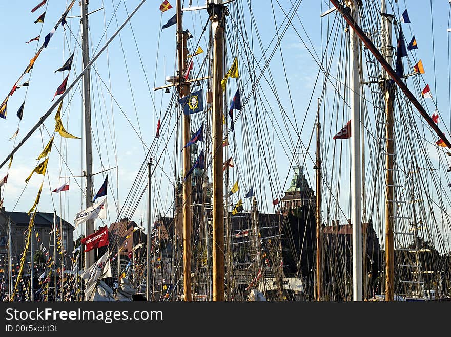 Masts of tall ships in a port