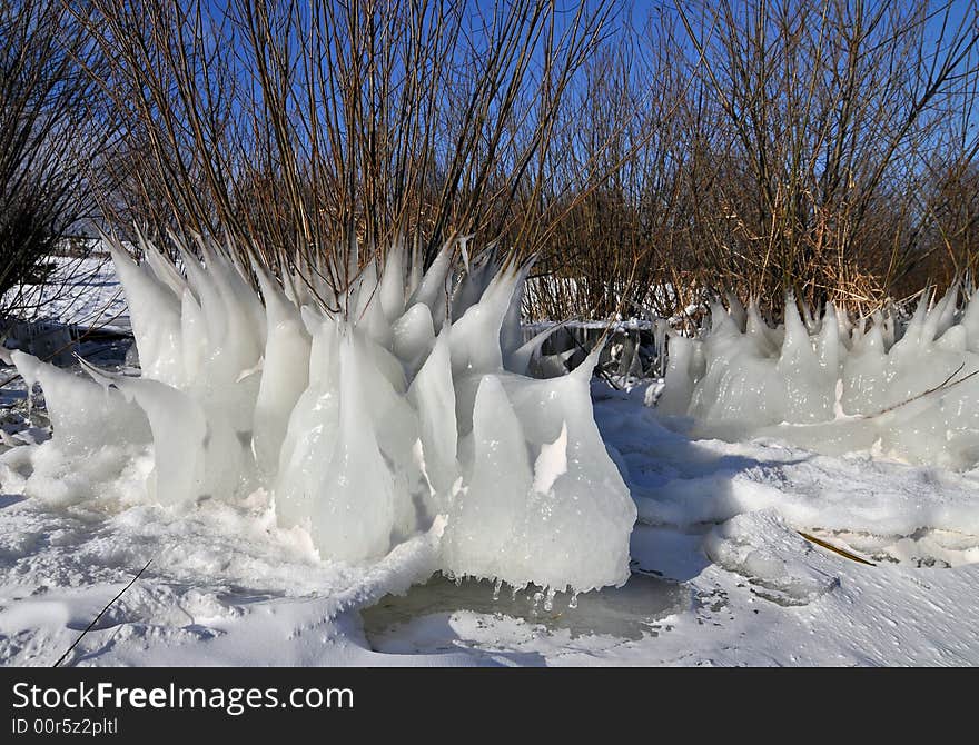 Fantastic white ice form  - blue sky background