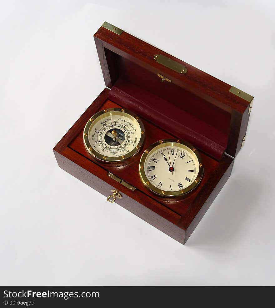 Old redwood box with watch and barometer inside  on white background. Old redwood box with watch and barometer inside  on white background