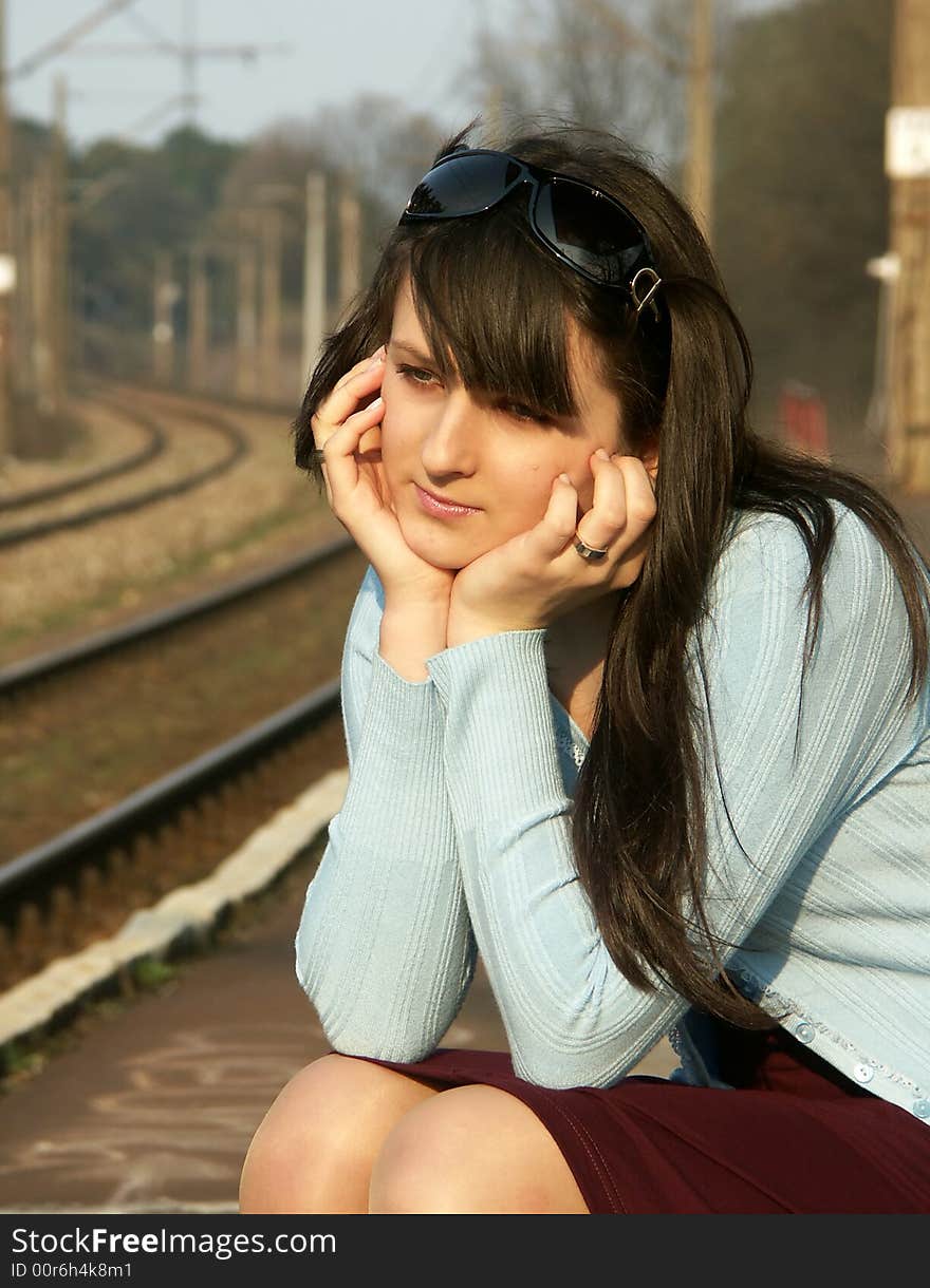 Girl waiting for the train