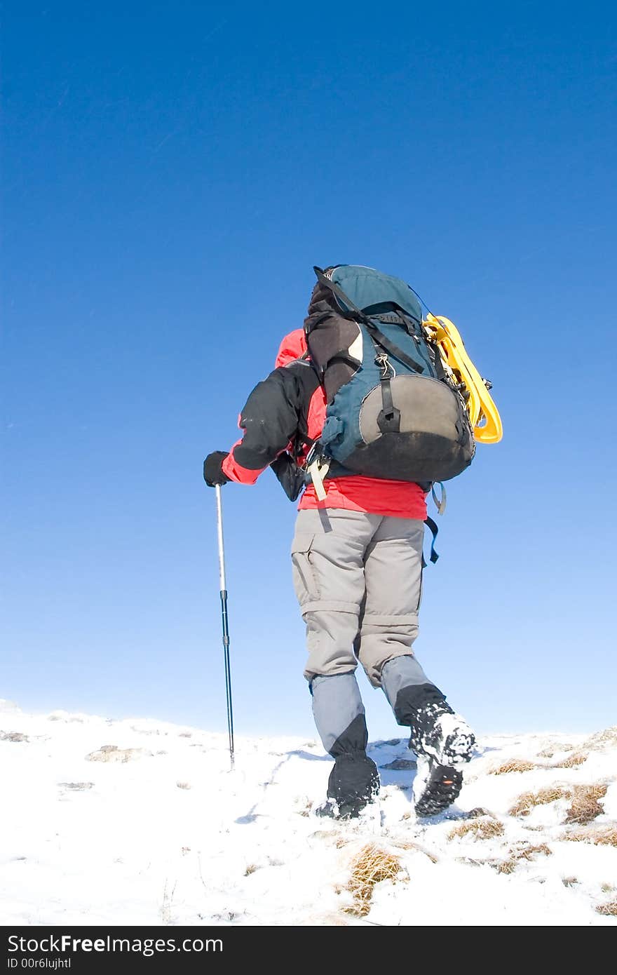 Tourists are in winter in mountains