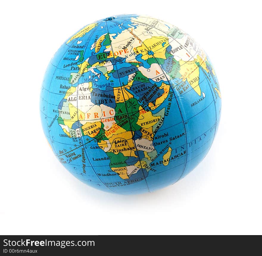 Small terrestrial globe europe and africa side isolated on white