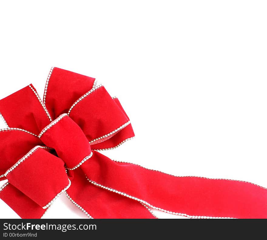 Red Bow on White Background with Copy Space