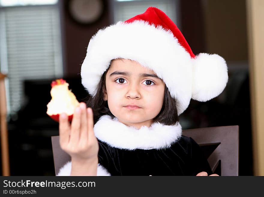 Girl eating apple and enjoying