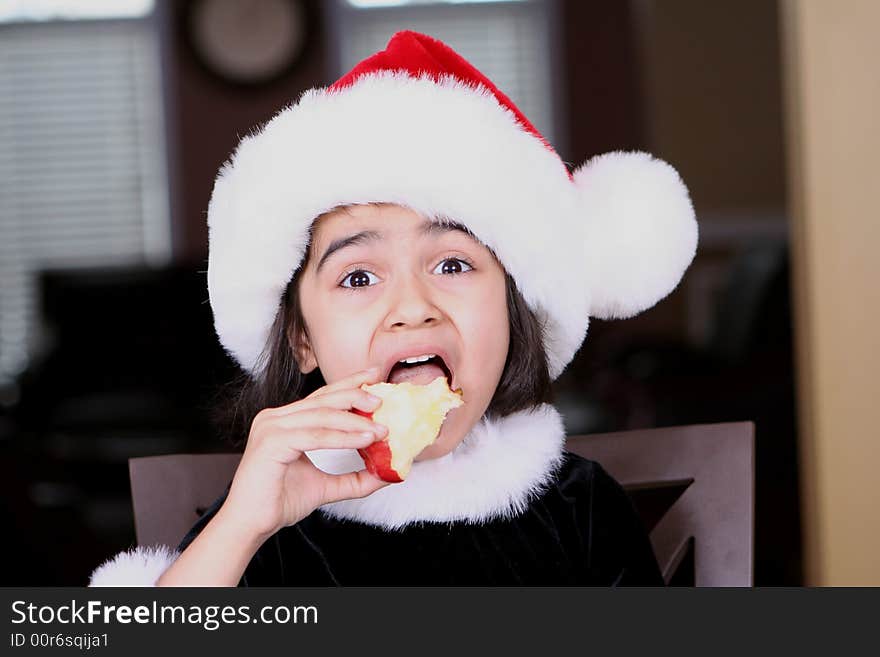 Girl eating apple and enjoying