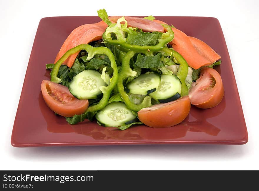 Garden salad isolated on white background.