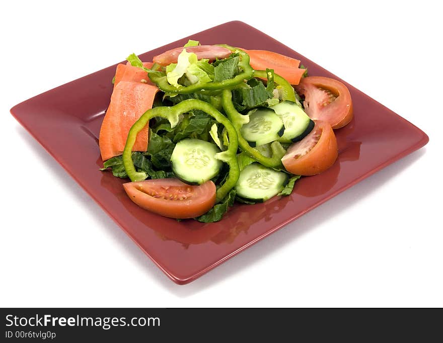 Garden salad isolated on white background.