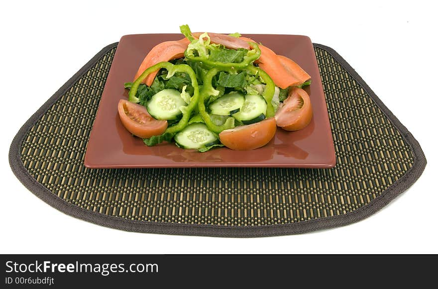 Garden salad isolated on white background.