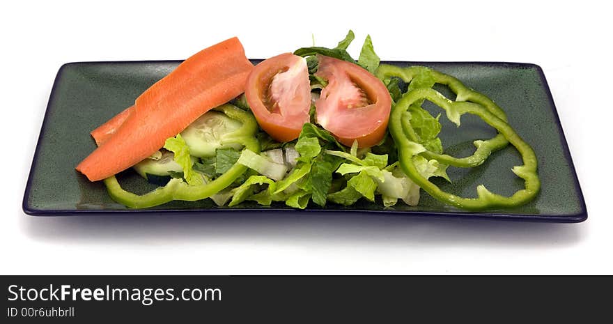 Garden salad isolated on white background.