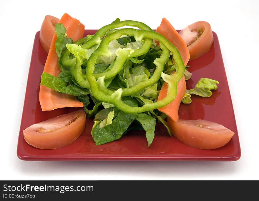 Garden salad isolated on white background.