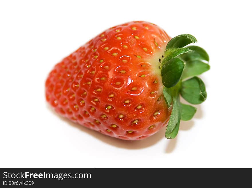 One strawberry closeup isolated on white