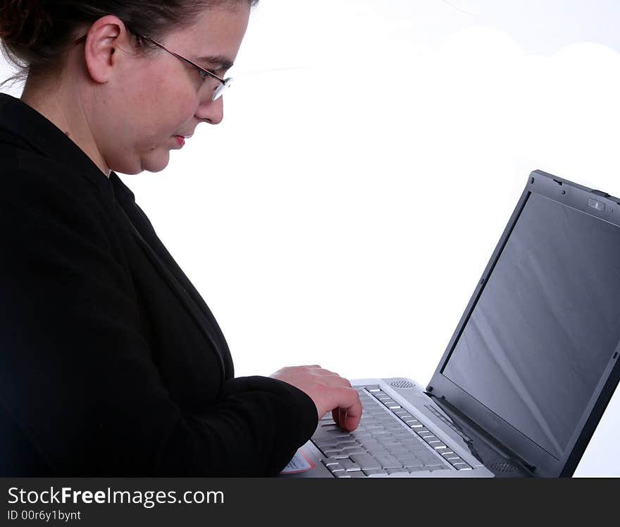 A businesswoman working on her laptop