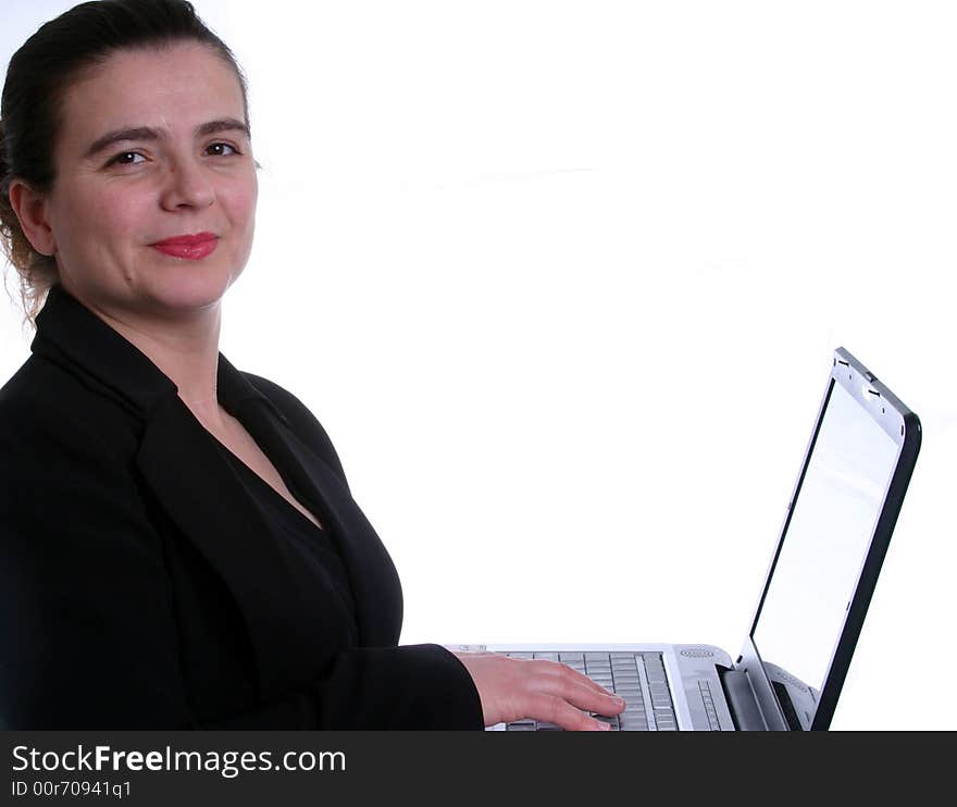 A businesswoman working on her laptop