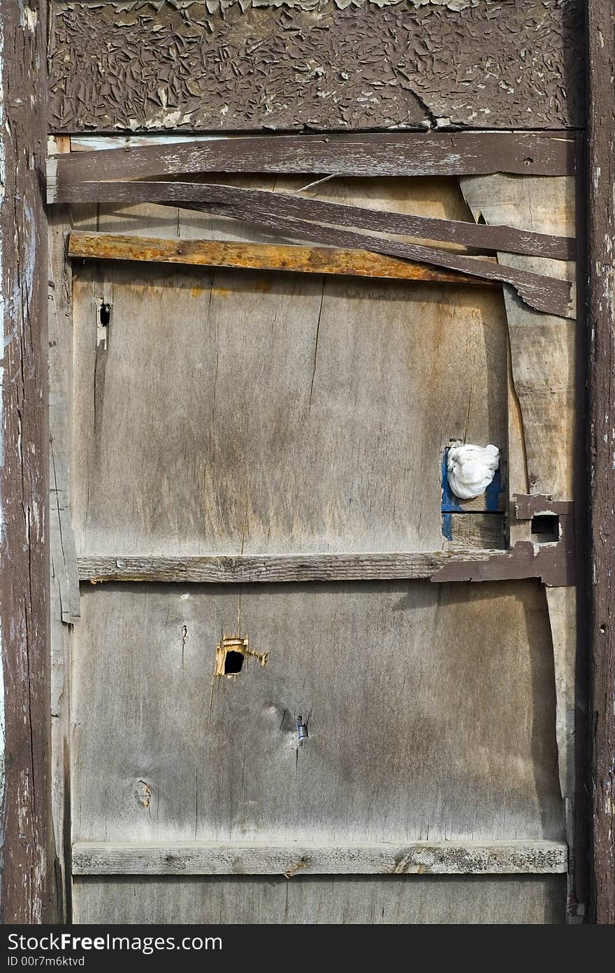 Detail of old wooden door with grunge texture. Detail of old wooden door with grunge texture