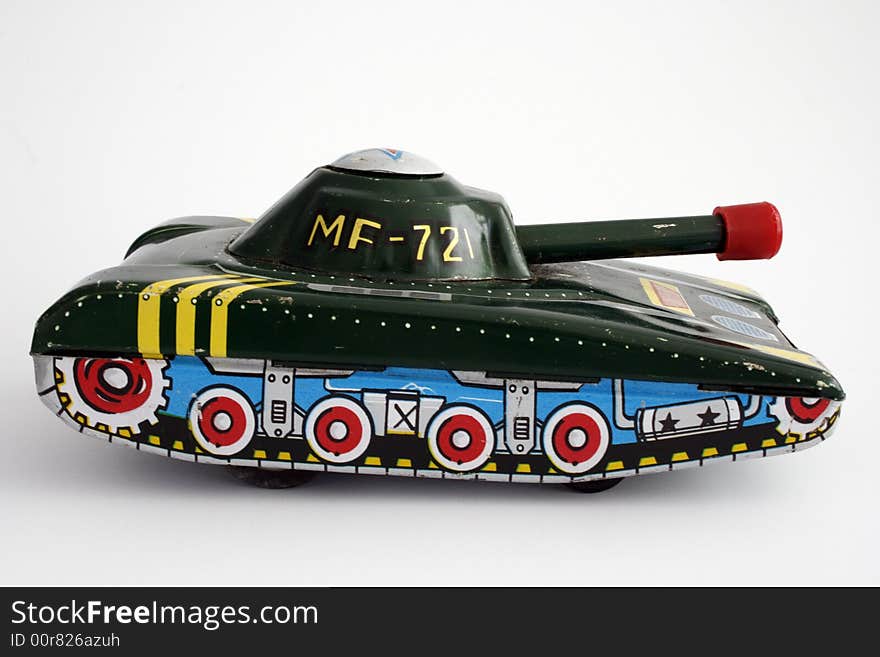 A little metal toy tank. A little metal toy tank