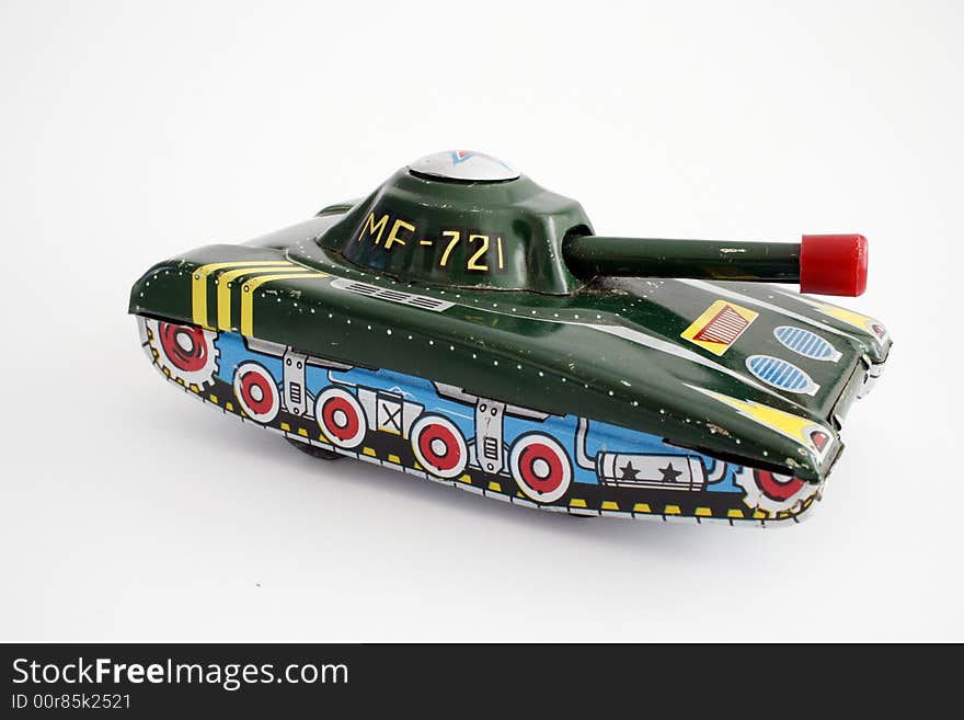 A little metal toy tank. A little metal toy tank