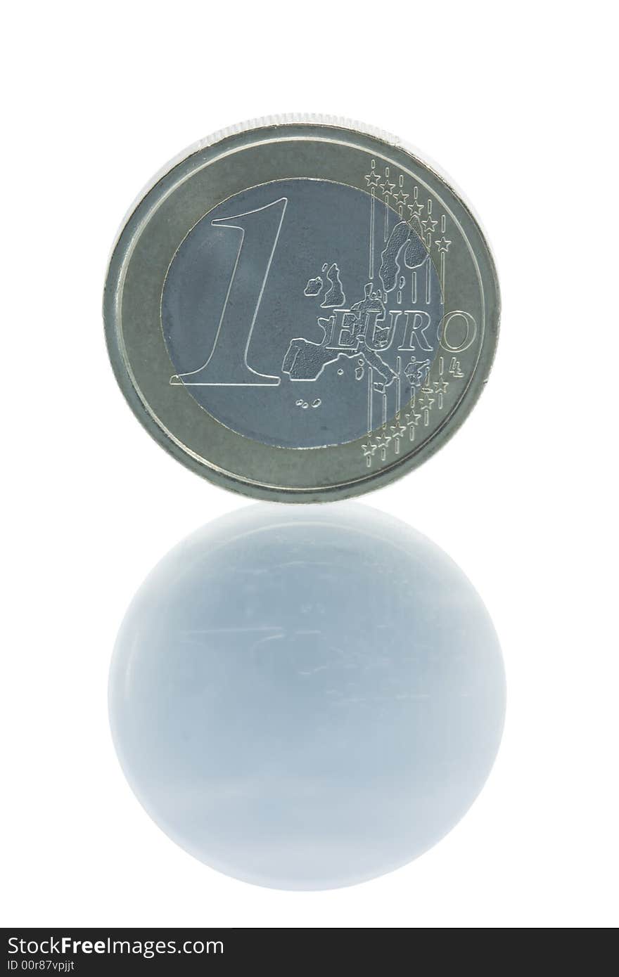 One euro coin standing on edge with reflection