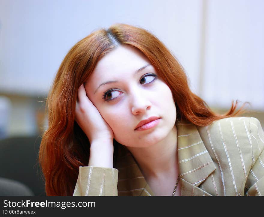 Girl with reddish hair in office #2
