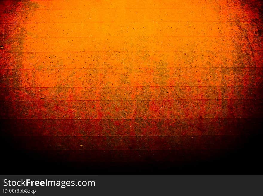 Gritty and corroded yellow and red background with transition to black. Gritty and corroded yellow and red background with transition to black