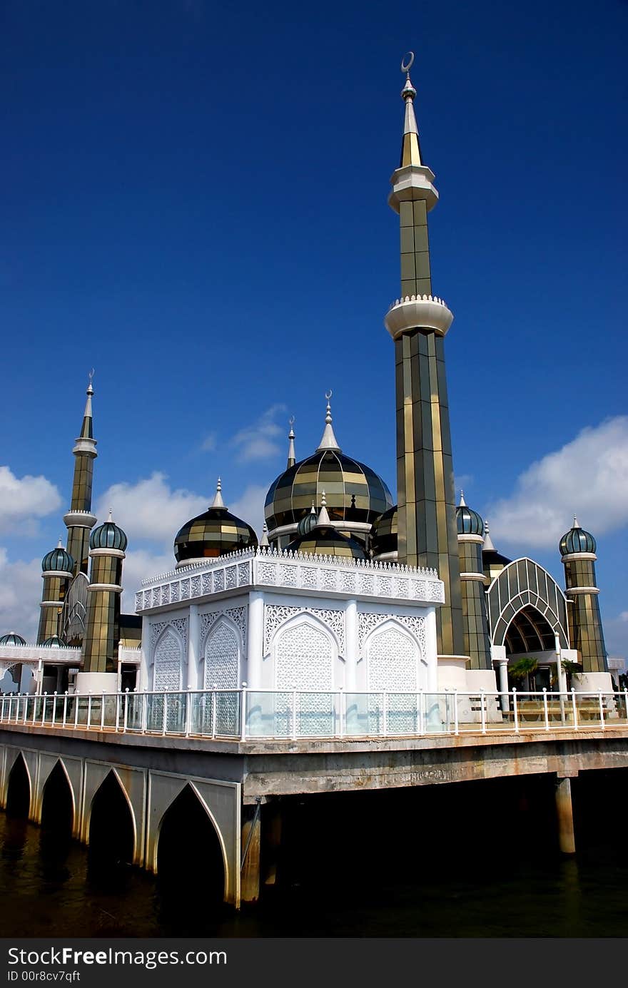 Mirror mosque on the blue sky background