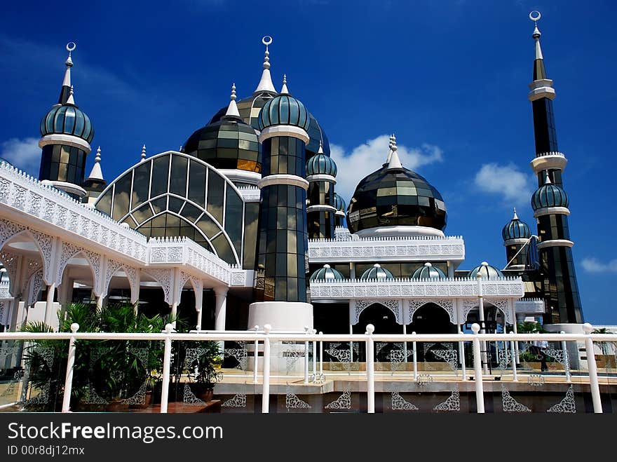 Mirror mosque on the blue sky background