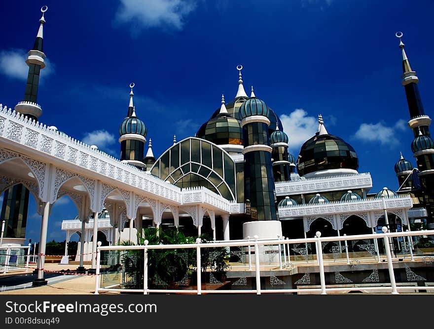 Mirror mosque on the blue sky background