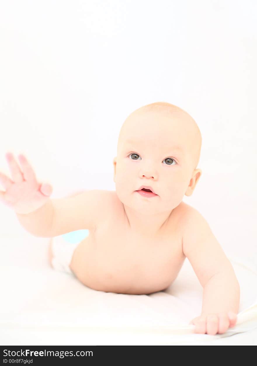 Funny little baby on white background