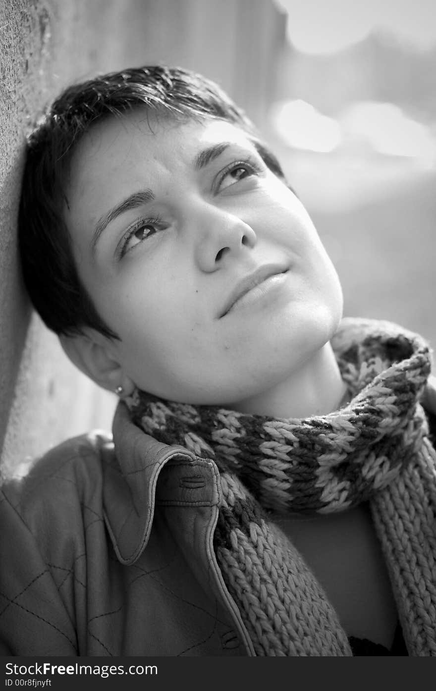 A view with a woman looking  thoughtful