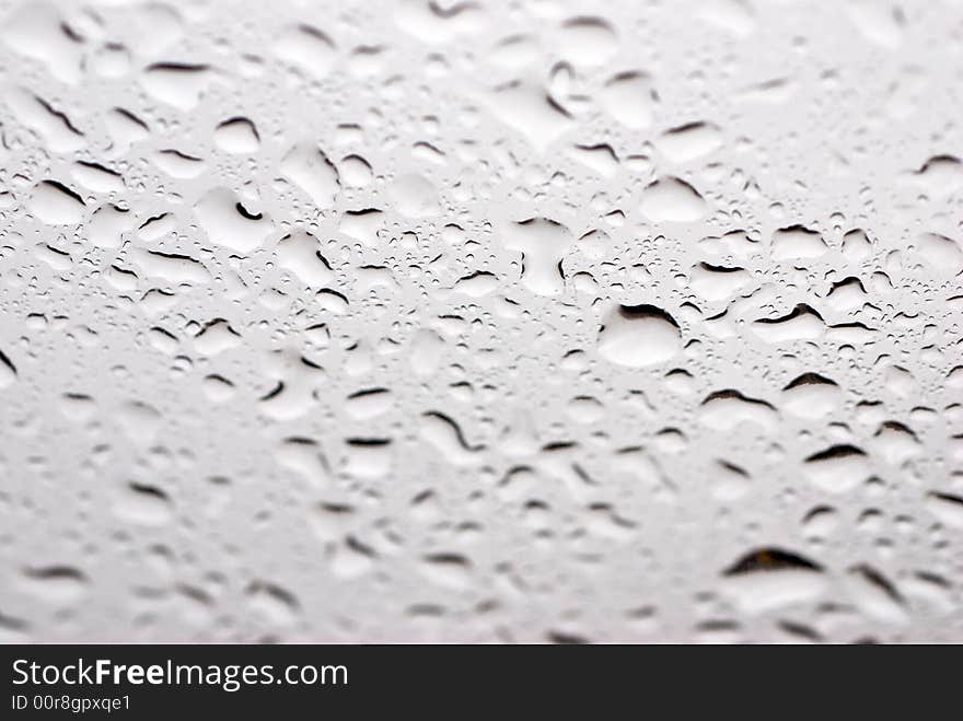 Drops of a rain on glass, liquid. Drops of a rain on glass, liquid