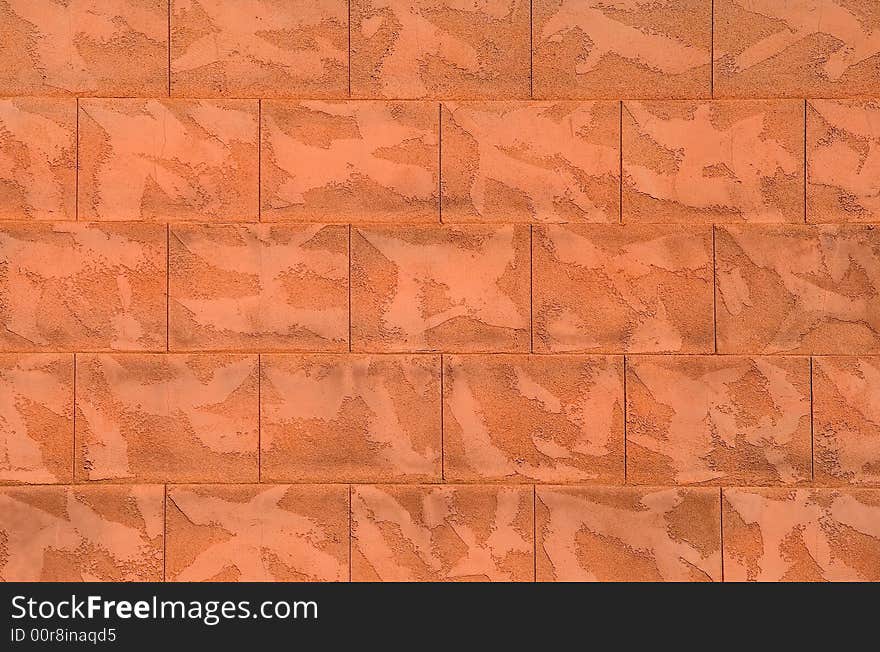 Orange stone wall texture, background