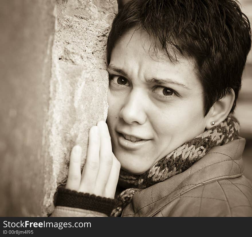 A view with a woman looking  thoughtful