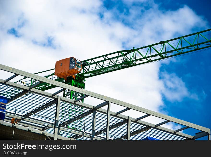 A tower crane engaged in building construction