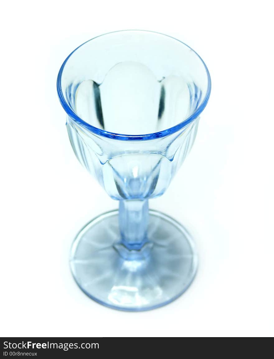 Blue glass goblet on white. Blue glass goblet on white