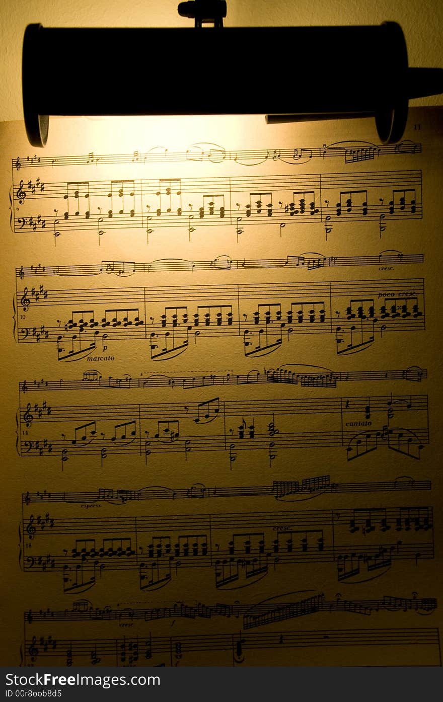 Note sheet lighten with lamp on music desk