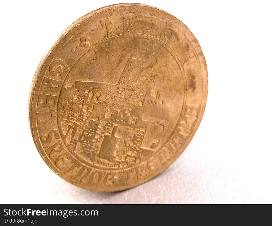 Ancient copper coin on the white background. Ancient copper coin on the white background