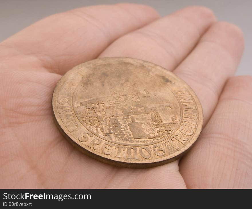 Ancient copper coin on the white background. Ancient copper coin on the white background