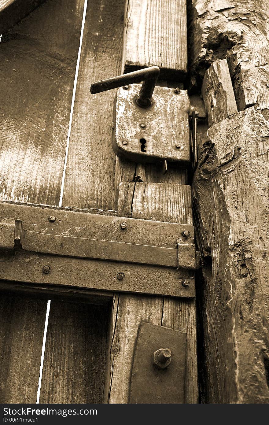 Close-up of an ancient and rusty door (vintage). Close-up of an ancient and rusty door (vintage)