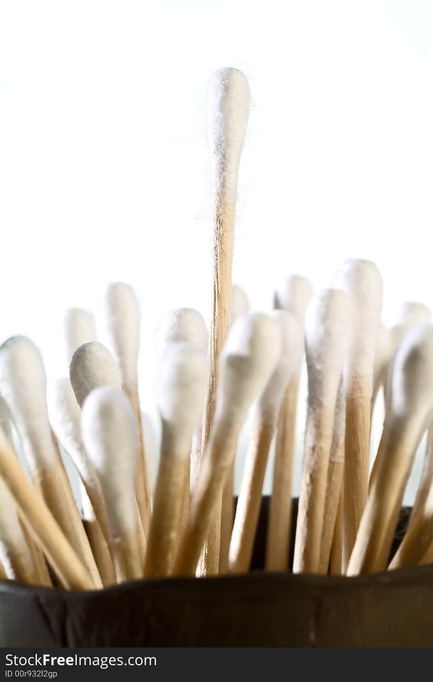 Detail of group of cotton tipped applicators with one sticking out