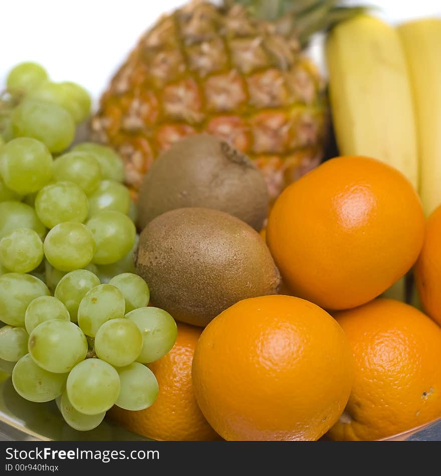 Colourful composition consisting of fresh fruit. The ingredients are: pineapple, bananas, kiwis, grapes, oranges. MY FOOD PHOTOS ». Colourful composition consisting of fresh fruit. The ingredients are: pineapple, bananas, kiwis, grapes, oranges. MY FOOD PHOTOS »