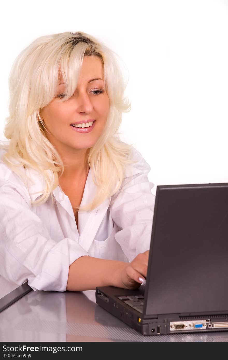 Blond caucasian model with laptop over white