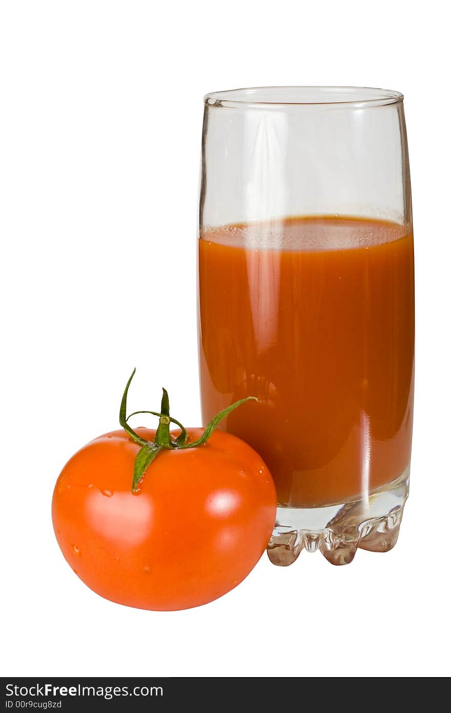 Tomato and glass of tomato juice isolated on white