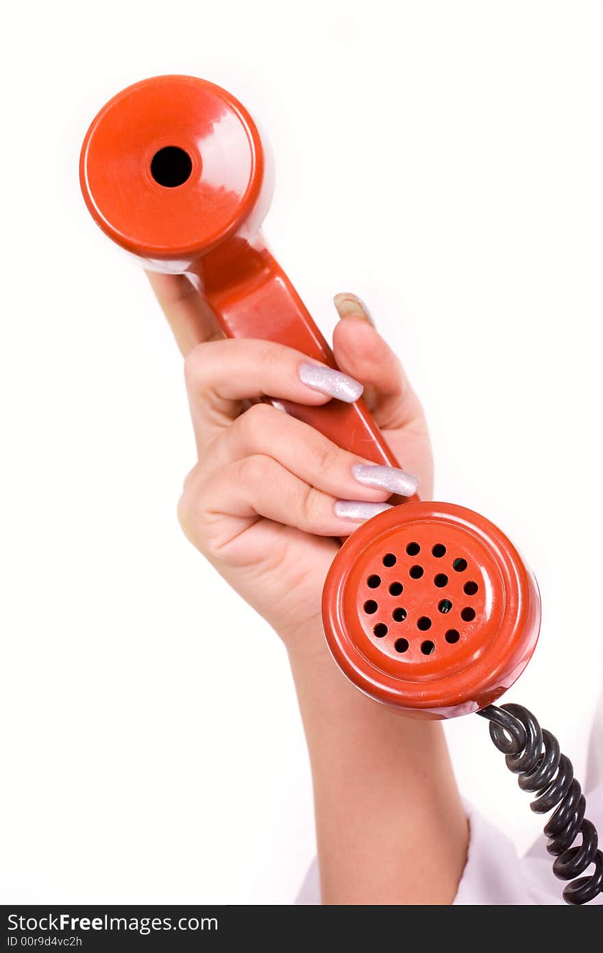 Woman's hand holding a red phone
