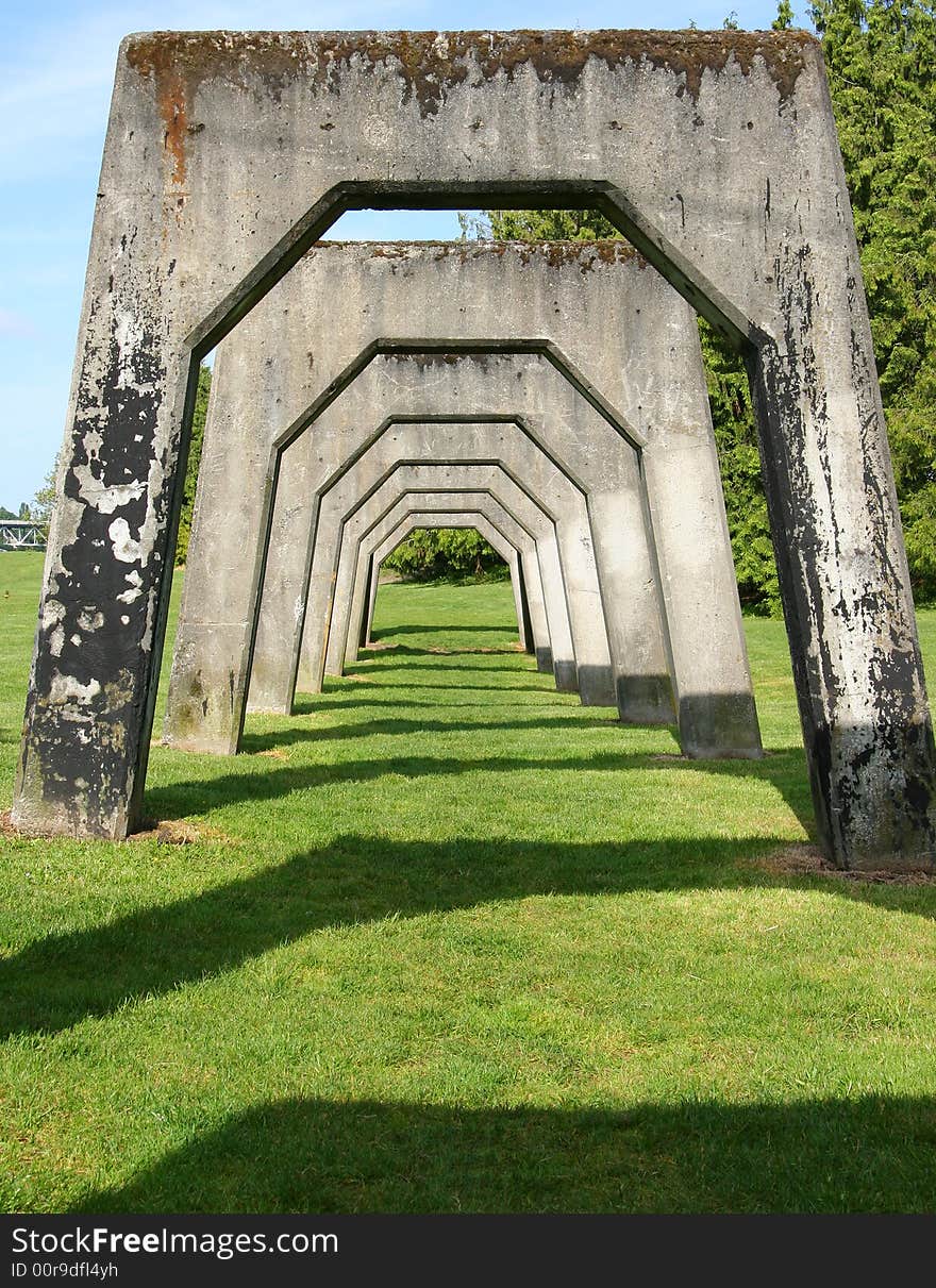 A shot of a row of arches in an industrial area. A shot of a row of arches in an industrial area