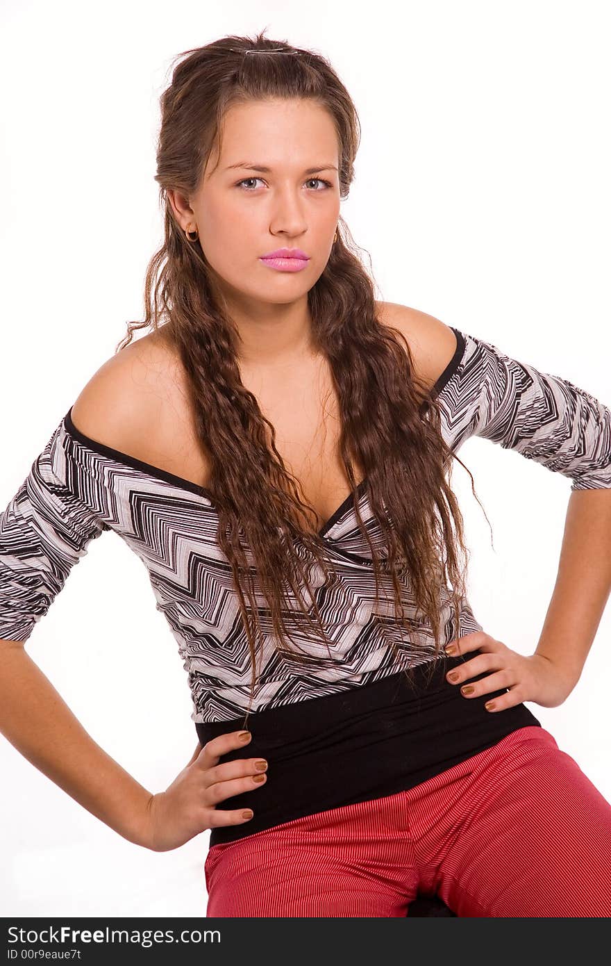 Portrait of pretty young woman in red skirt over white