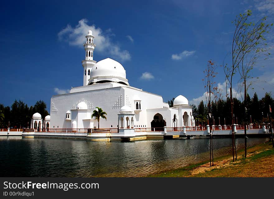 Flouting mosque on the blue sky background