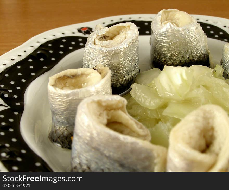 Rolled herring with onion.